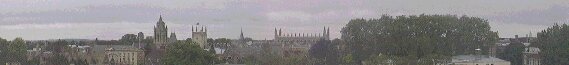 Panoramic view over the rooftops of Cambridge - in the centre the four spires of King's College Chapel